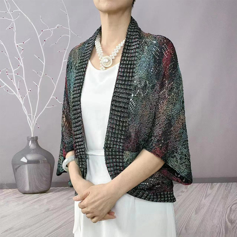 Modische langärmelige hohle Strickjacke