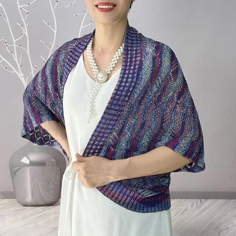 Modische langärmelige hohle Strickjacke