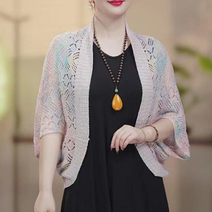 Modische langärmelige hohle Strickjacke