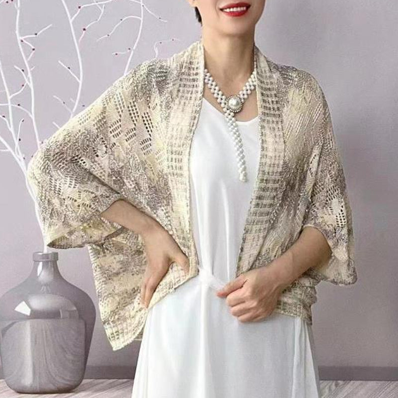 Modische langärmelige hohle Strickjacke