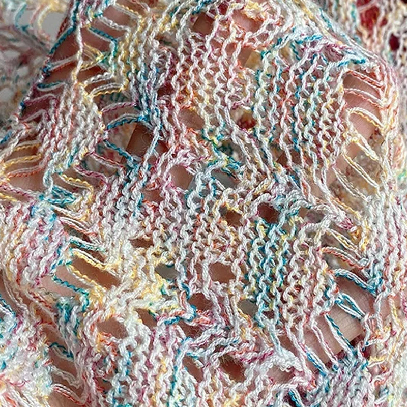 Modische langärmelige hohle Strickjacke