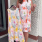Ärmelloses Midikleid mit Plissee und Blumenprint und betonter Taille
