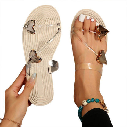 Flache Sandalen mit offener Zehe und herzförmigem Dekor