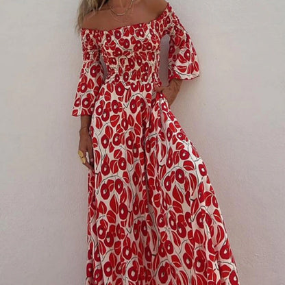 Langes Kleid mit Blumenmuster, offenen Schultern und ausgestellten Ärmeln