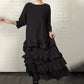 Übergroßes, fließendes Kleid mit Rüschen und Lagen